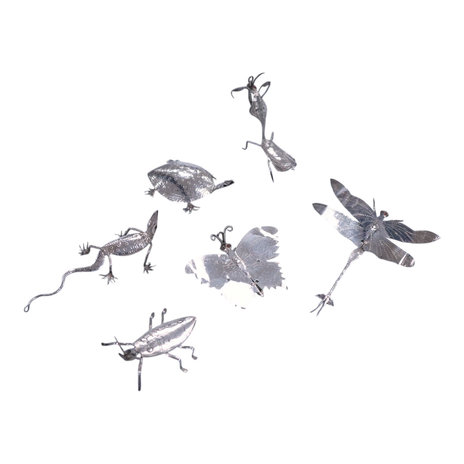 Six Thai or Malaysian white metal models of creatures, to include a Praying Mantis, height 45mm, a tortoise, a dragonfly, a butterfly, a lizard and a beetle.